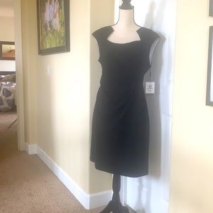 Calvin Klein. Never worn. Black cocktail dress.